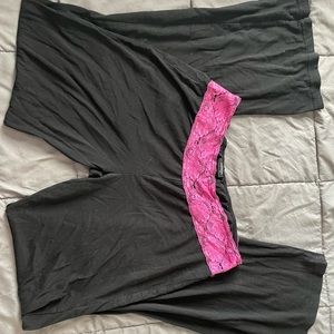 Black yoga pants with pink lace waist band